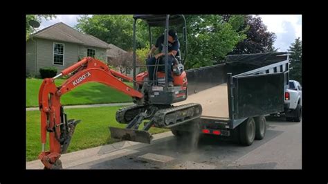 how to unload an excavator